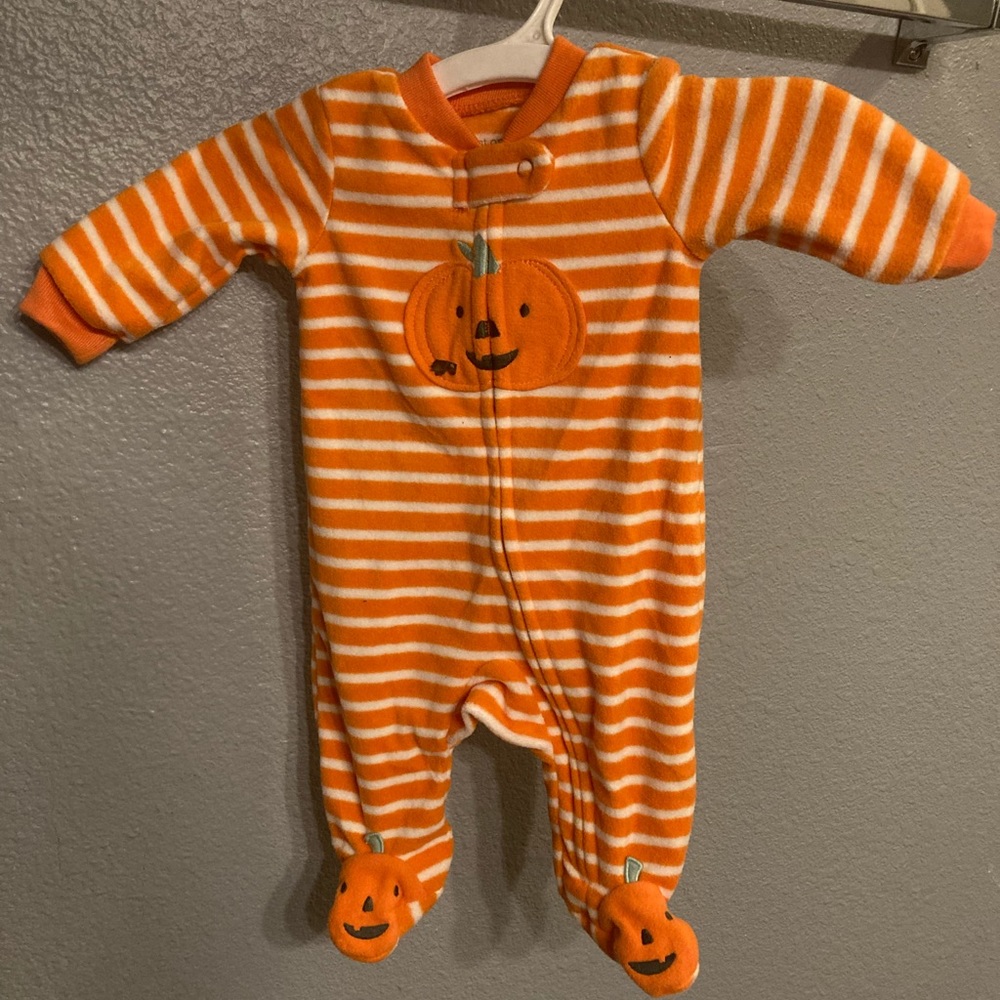 Carter’s NB orange and white onesie